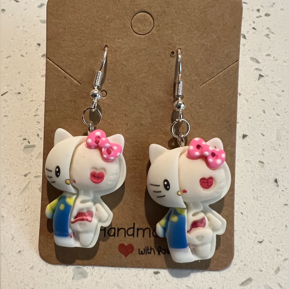 Hello Kitty cute💜 & creepy💀 Handcrafted dangling earrings- hypoallergenic hook
